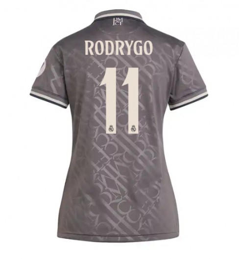 Köpa Billiga Dam Real Madrid Tredjetröja 2024/25 Rodrygo Goes 11 Kortärmad 1 Köpa Billiga Dam Real Madrid Tredjetröja 2024/25 Rodrygo Goes 11 Kortärmad