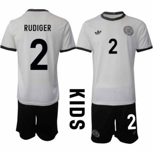 Köp Tyskland Barn Hemmatröja 2025/26 Antonio Rüdiger 2 Fotbollsställ Kortärmad (+ Korta byxor) – Tysklands 125-årsjubileumskit
