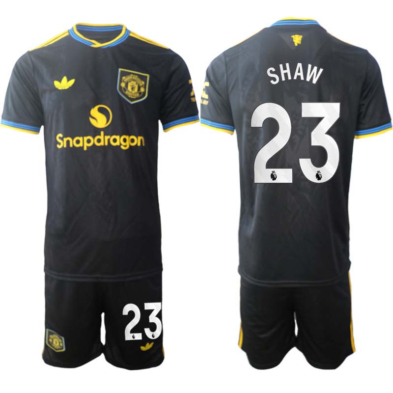 Manchester United Tredjeställ Herr 2025/26 Luke Shaw #23 Kortärmad Fotbollströja + Shorts