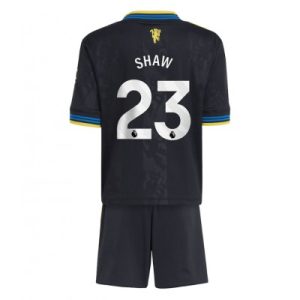 Manchester United Barn Tredjeställ 2025/26 Luke Shaw 23 Kortärmad Tröja + Shorts