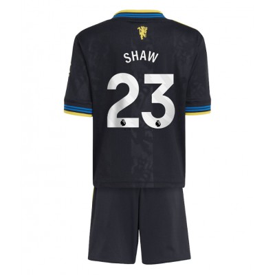 Manchester United Barn Tredjeställ 2025/26 Luke Shaw 23 Kortärmad Tröja + Shorts 1 Manchester United Barn Tredjeställ 2025/26 Luke Shaw 23 Kortärmad Tröja + Shorts