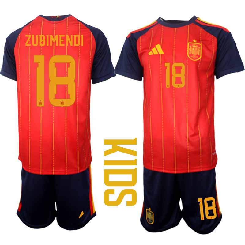 Spanien 2026 VM Hemmaställ Barn Mikel Zubimendi #18 Kortärmad Fotbollströja + Shorts 1 Spanien 2026 VM Hemmaställ Barn Mikel Zubimendi #18 Kortärmad Fotbollströja + Shorts